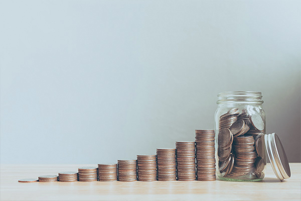 Towers of coins increasing in size.