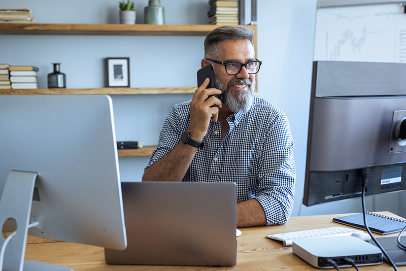 Businessman on the phone and computer